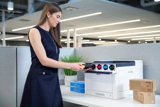 woman using a xerox printer