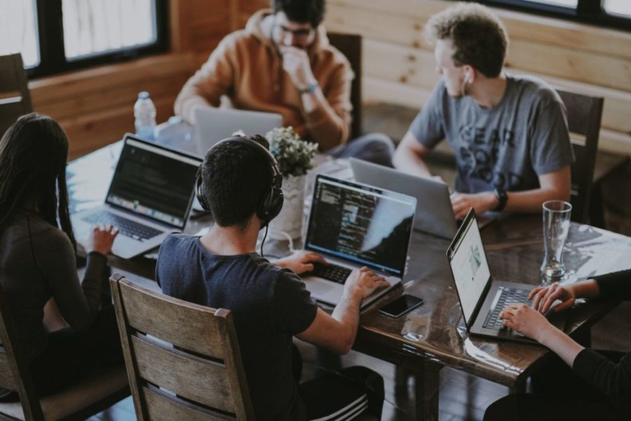 people sitting around a desk